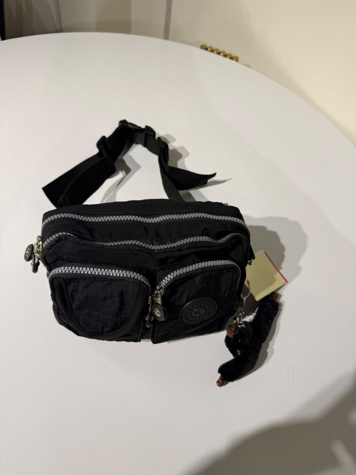 kipling Waist bag and cross