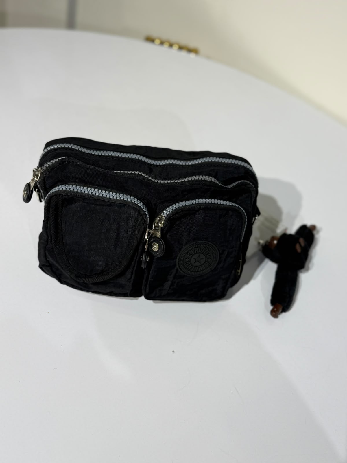 kipling Waist bag and cross