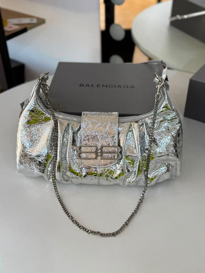 Large Balenciaga Pamela shoulder bag features a crinkled leather finish and distinctive silver-tone hardware