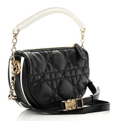 Christian Dior Vibe bag features black cannage quilted lambskin leather with a distinct half-moon shape