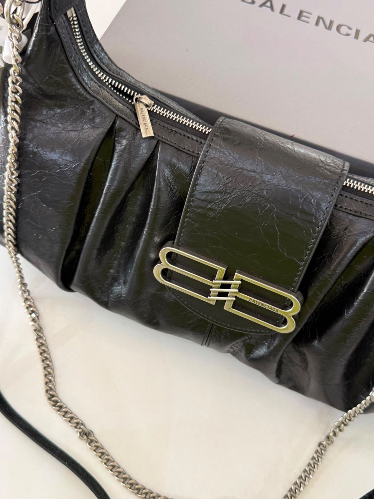 Large Balenciaga Pamela shoulder bag features a crinkled leather finish and distinctive silver-tone hardware