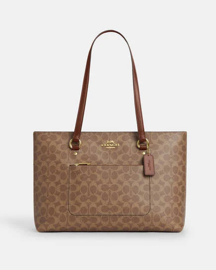 COACH Station Tote Bag
In Signature Canvas
