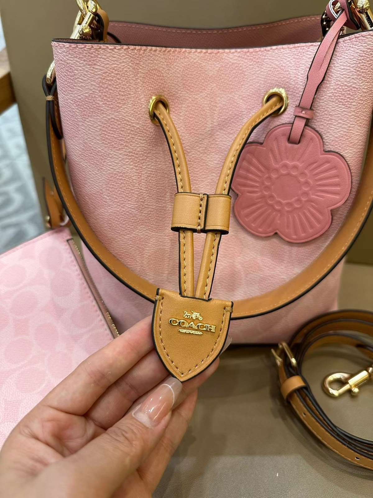 COACH Signature Canvas Blush Pink Drawstring Bucket Bag