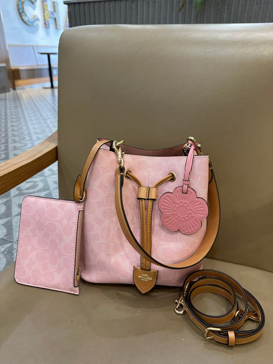 COACH Signature Canvas Blush Pink Drawstring Bucket Bag