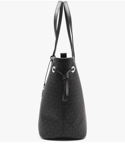 Michael Kors Jet Set Travel large tote bag featuring the signature logo print and silver
