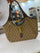 Gucci Mercato medium Tote Bag is crafted from monogrammed GG canvas with dark brown leather trim