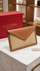 Valentino Garavani Rockstud raffia clutch