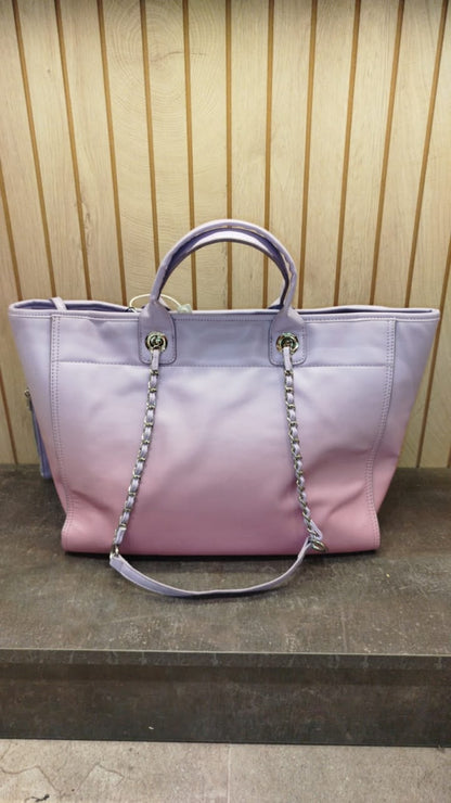 Chanel Deauville tote bag made of shaded calfskin in a light purple and pink color
