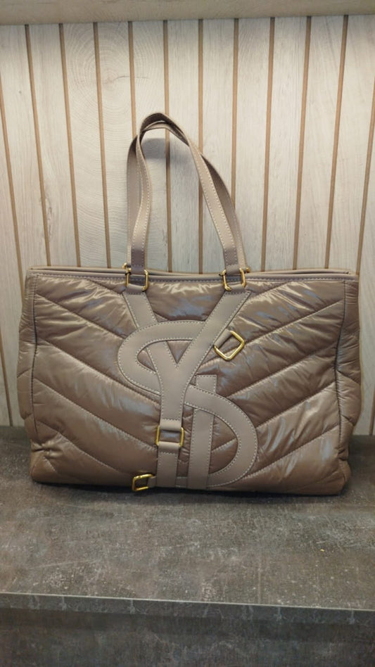 YSL tote bag, features a quilted, nylon puffer design in a taupe color with prominent YSL branding.