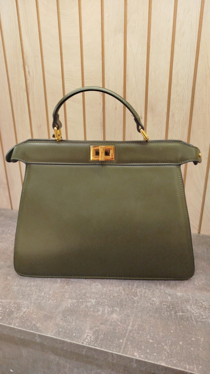 Fendi Peekaboo ISeeU East-West handbag in a green shade, featuring signature gold-tone twist-lock hardware