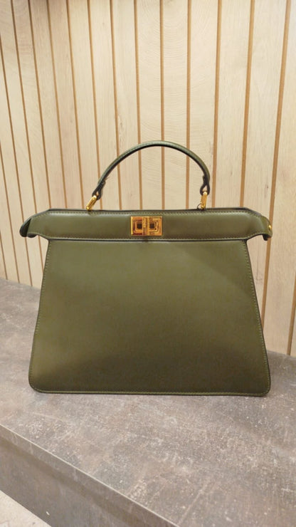 Fendi Peekaboo ISeeU East-West handbag in a green shade, featuring signature gold-tone twist-lock hardware