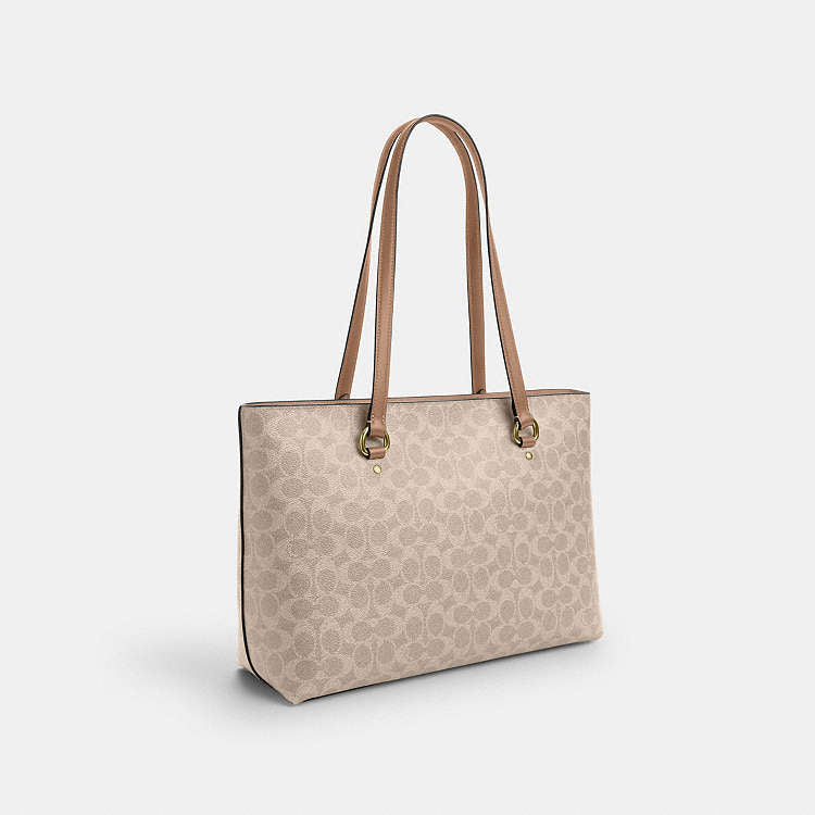 COACH Station Tote Bag
In Signature Canvas