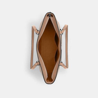 COACH Station Tote Bag
In Signature Canvas