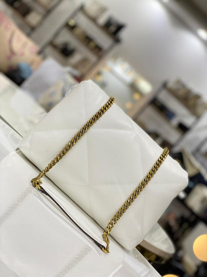 Tory Burch Kira Diamond-Quilted Convertible Shoulder Bag.
