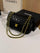 Chanel Classic Flap Bag (Black Quilted Lambskin with Gold-Tone Hardware)