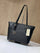 Michael Kors Charlotte Large Top Zip Tote in black logo print and leather.