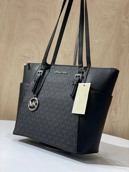 Michael Kors Charlotte Large Top Zip Tote in black logo print and leather.