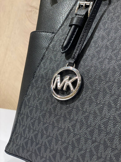 Michael Kors Charlotte Large Top Zip Tote in black logo print and leather.