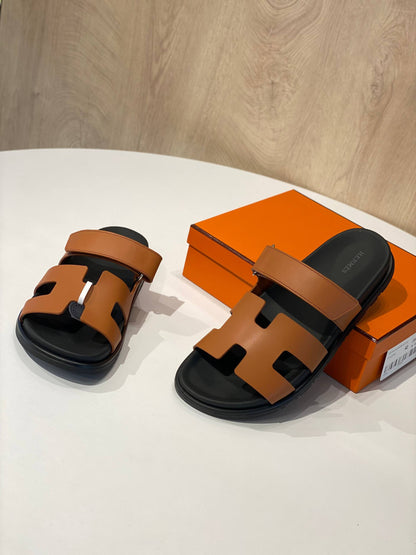 Hermès Chypre Sandals – Classic Gold Calfskin & Black