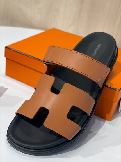 Hermès Chypre Sandals – Classic Gold Calfskin & Black